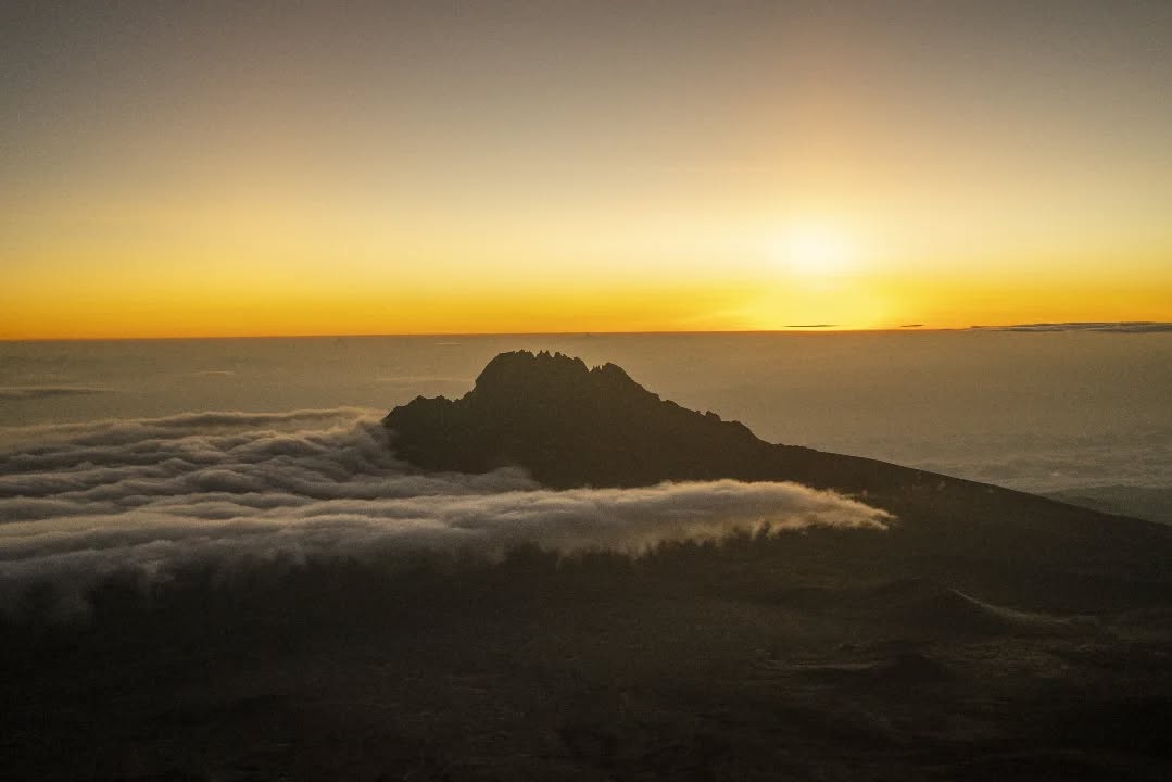 Sunrise at Stella Point on the crater rim