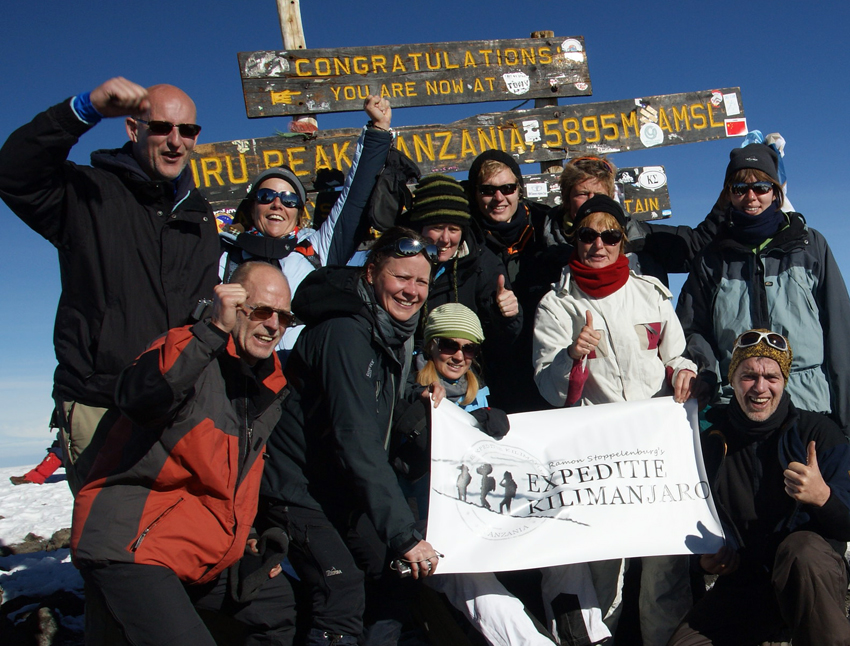 Group photo at Uhuru Peak, Mount Kilimanjaro summit